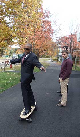 Daymond John on Skateboard